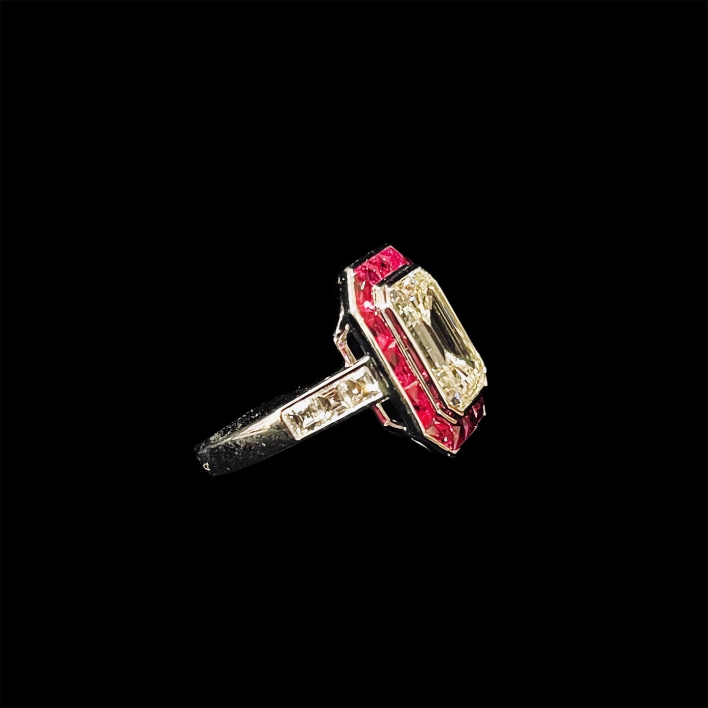 136-0 | Platinum Ring Emerald cut Diamond 5.02 cts L-M Color VS2 Ruby 1.48 cts Diamonds 0.64 cts