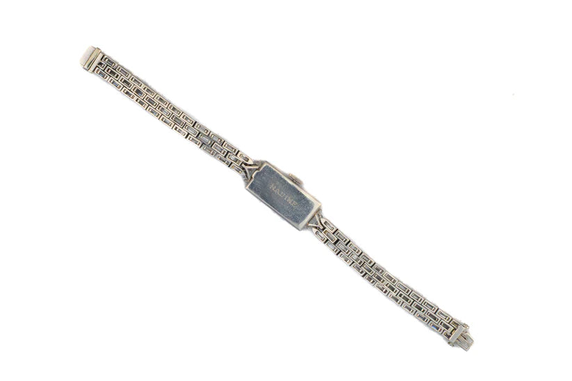 483-43 DEXEX | Harry Winston platinum Diamond cocktail watch with Audemars Piguet movement  84 baguette cut Diamonds 9.43 ct 2 triangular Cat and Diamonds 1.73 ct